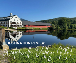 Scenic view of Waterville Valley, NH with a picturesque lodge reflecting on a calm pond, used as a header image for a destination review blog post.